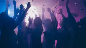 People party in a club - Orange Tesla Ecstasy Pills Dangerous New Club Drug