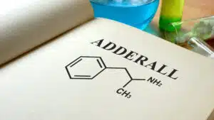 A book page with the chemical formula for Adderall - The Truth About Adderall What You Need To Know